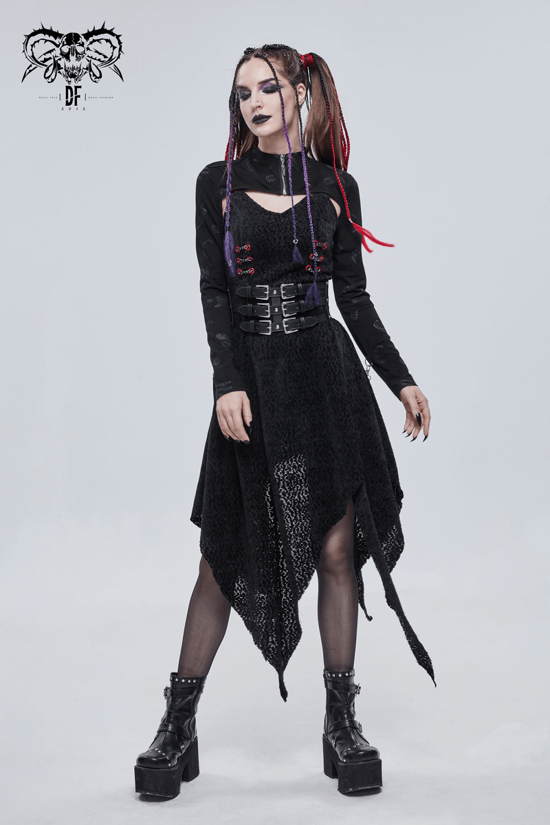 Gothic women wearing black cape with stylish lacing and strappy design, showcasing edgy fashion vibes.