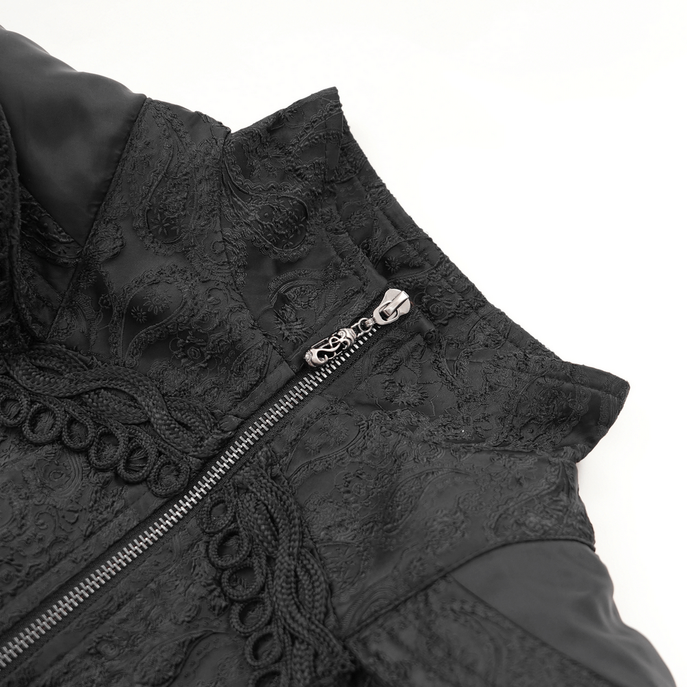 Close-up of Gothic brocade hooded coat with intricate embroidery and lace trim detailing.