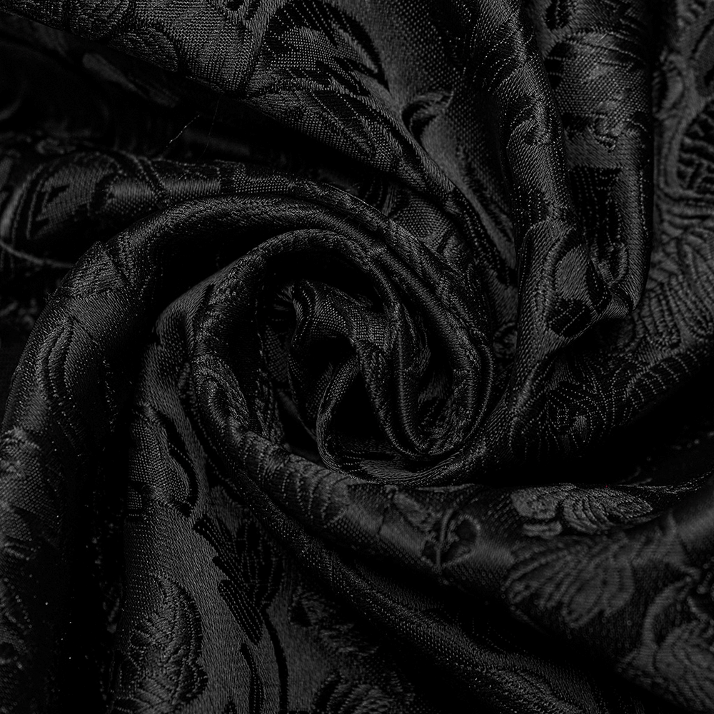 Close-up of elegant black brocade fabric featuring intricate floral patterns, perfect for Gothic waistcoats.