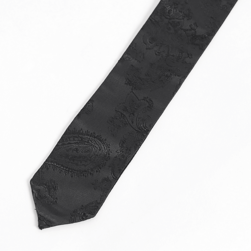 Gothic brocade necktie in black paisley with dagger charms and tassel detail for dark fashion lovers.