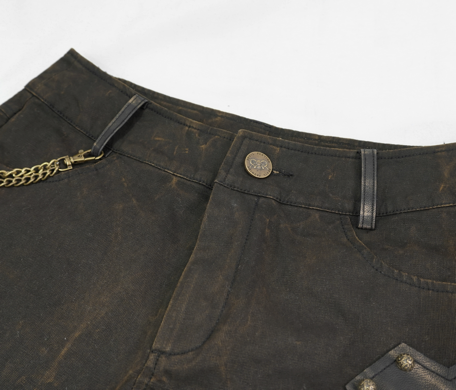 Close-up of gothic brown rivets studded shorts, featuring leather inserts and bronze rivets, perfect for steampunk style.
