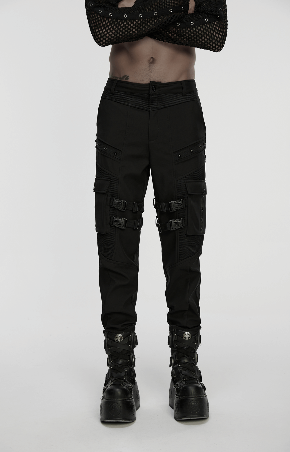 Gothic Buckle Cargo Pants with Mesh and Strap Details worn by a model, showcasing punk style with buckles and pockets.