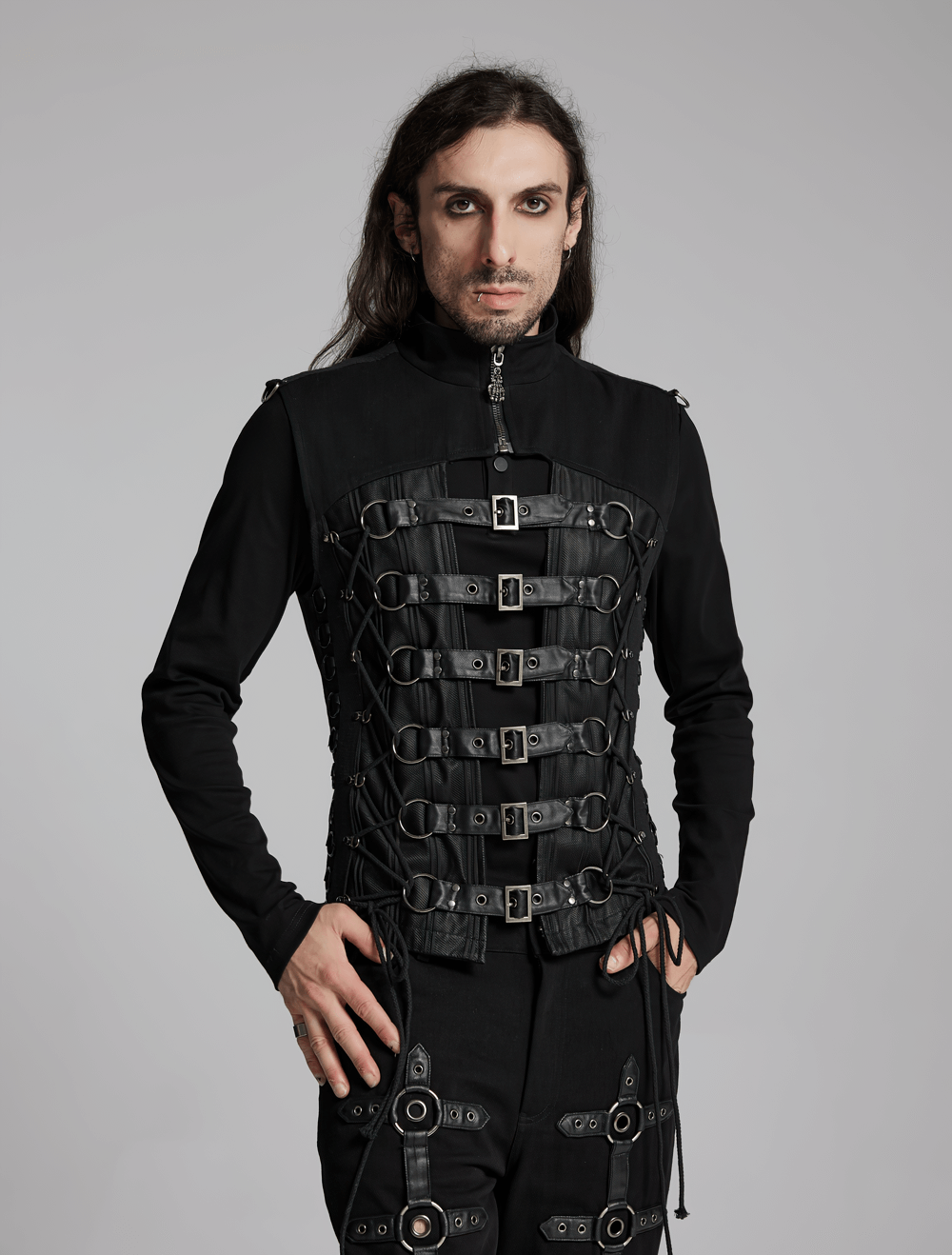 Model showcasing a Gothic buckle strap vest with lace-up back design, highlighting edgy punk style and metal details.