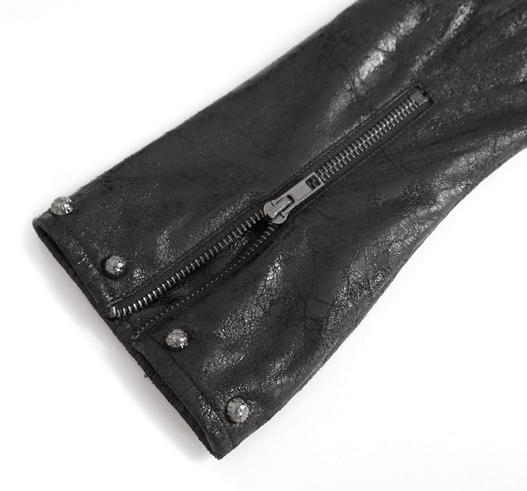 Close-up of a gothic black sleeve with a zipper and studded accents, perfect for punk urban fashion.