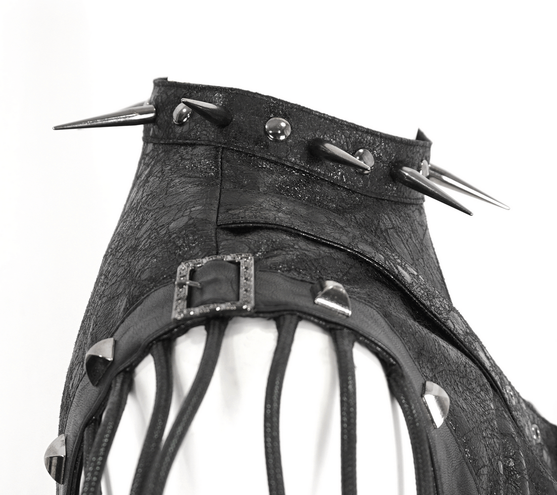 Gothic one-shoulder accessory with spikes and buckles, perfect for bold urban fashion and punk looks.