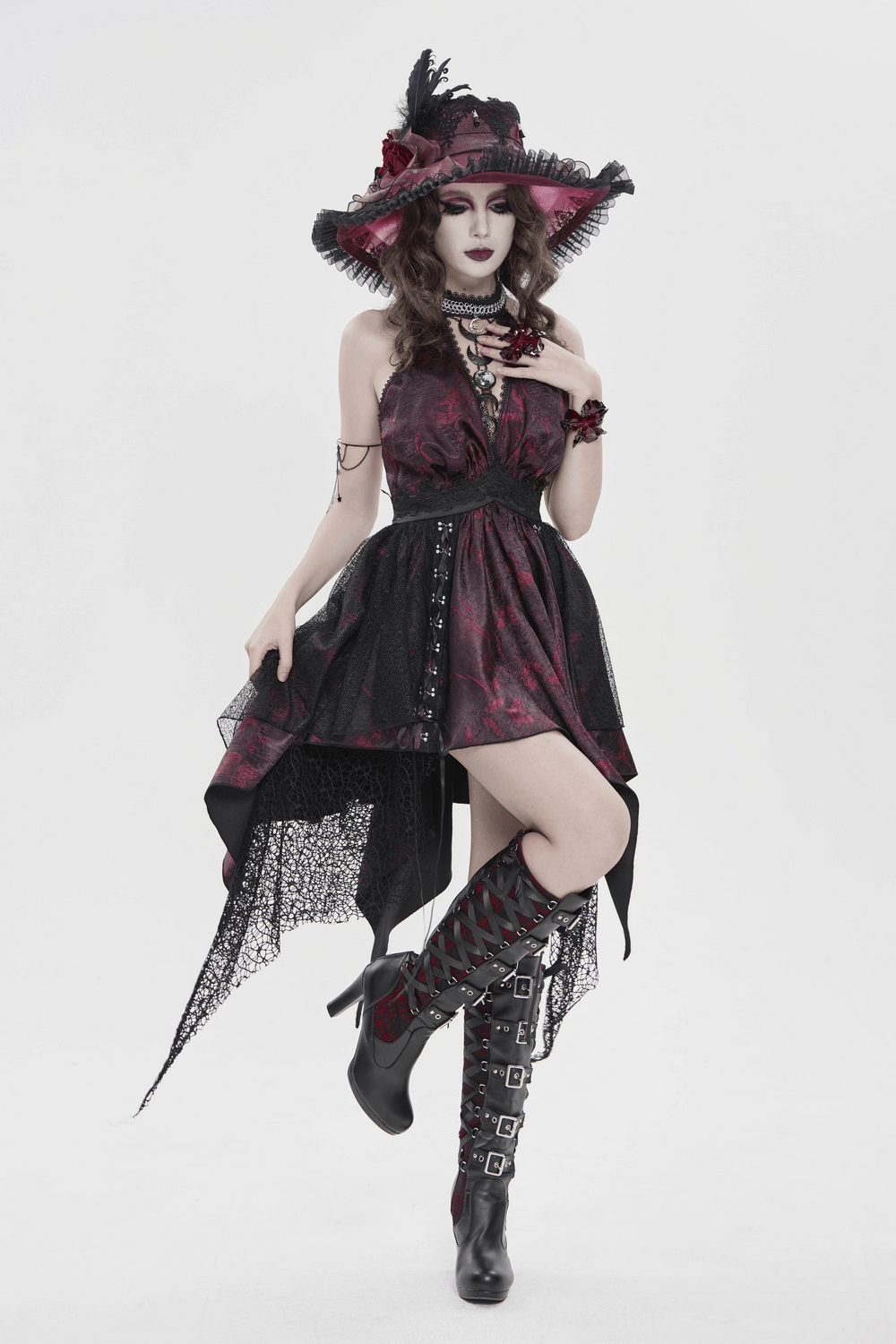 Gothic Burgundy Halter Dress with Lace Layers model wearing stylish accessories and knee-high boots.