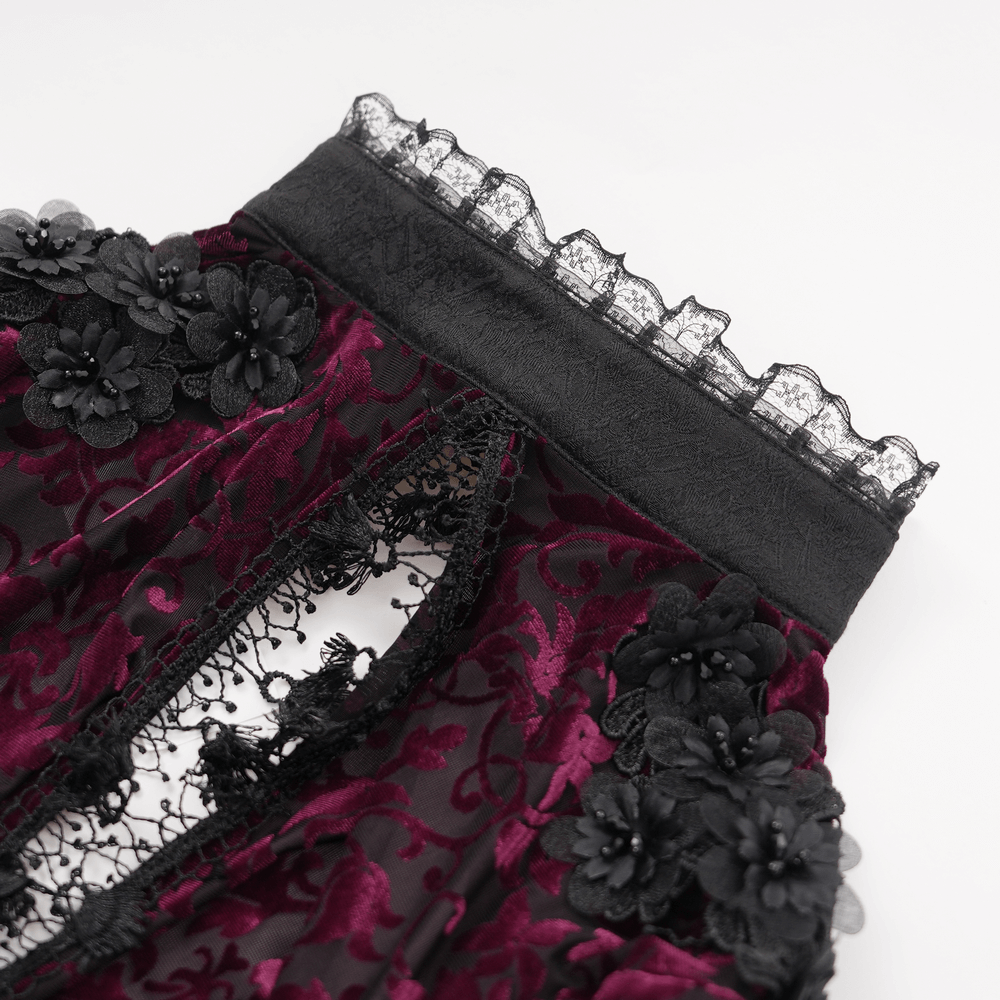 Close-up of gothic burgundy lace bolero with intricate floral details and black lace trim, perfect for dark elegance.