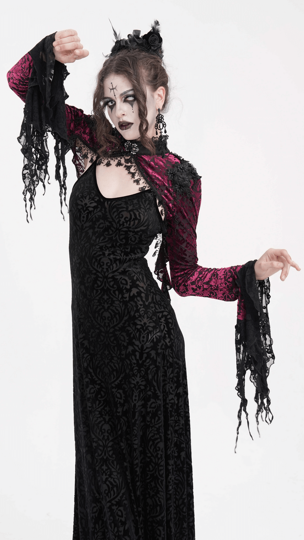 Model showcasing Gothic Burgundy Lace Bolero with Victorian bell sleeves, exuding dark elegance and mystique in a stunning outfit.