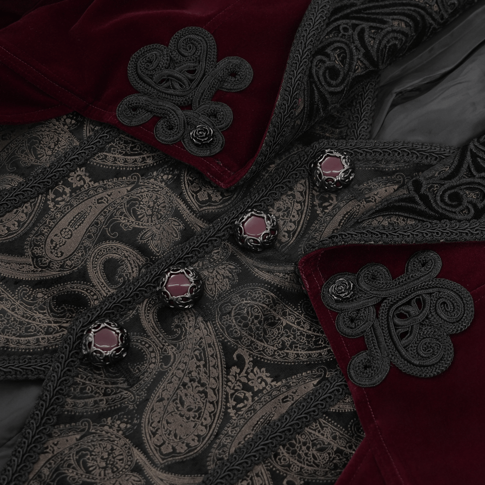 Close-up of gothic burgundy tailcoat with embossed black brocade, gem-encrusted buttons, and intricate cuff details.