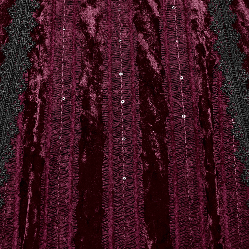 Close-up of gothic burgundy velvet fabric featuring lace trim, metal details, and textured stripes.