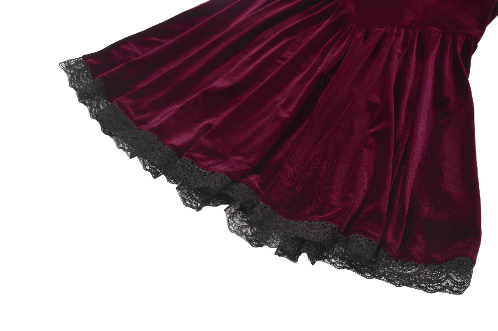 Gothic burgundy velvet dress showing lace trim and pleated skirt, perfect for vintage-inspired outfits.