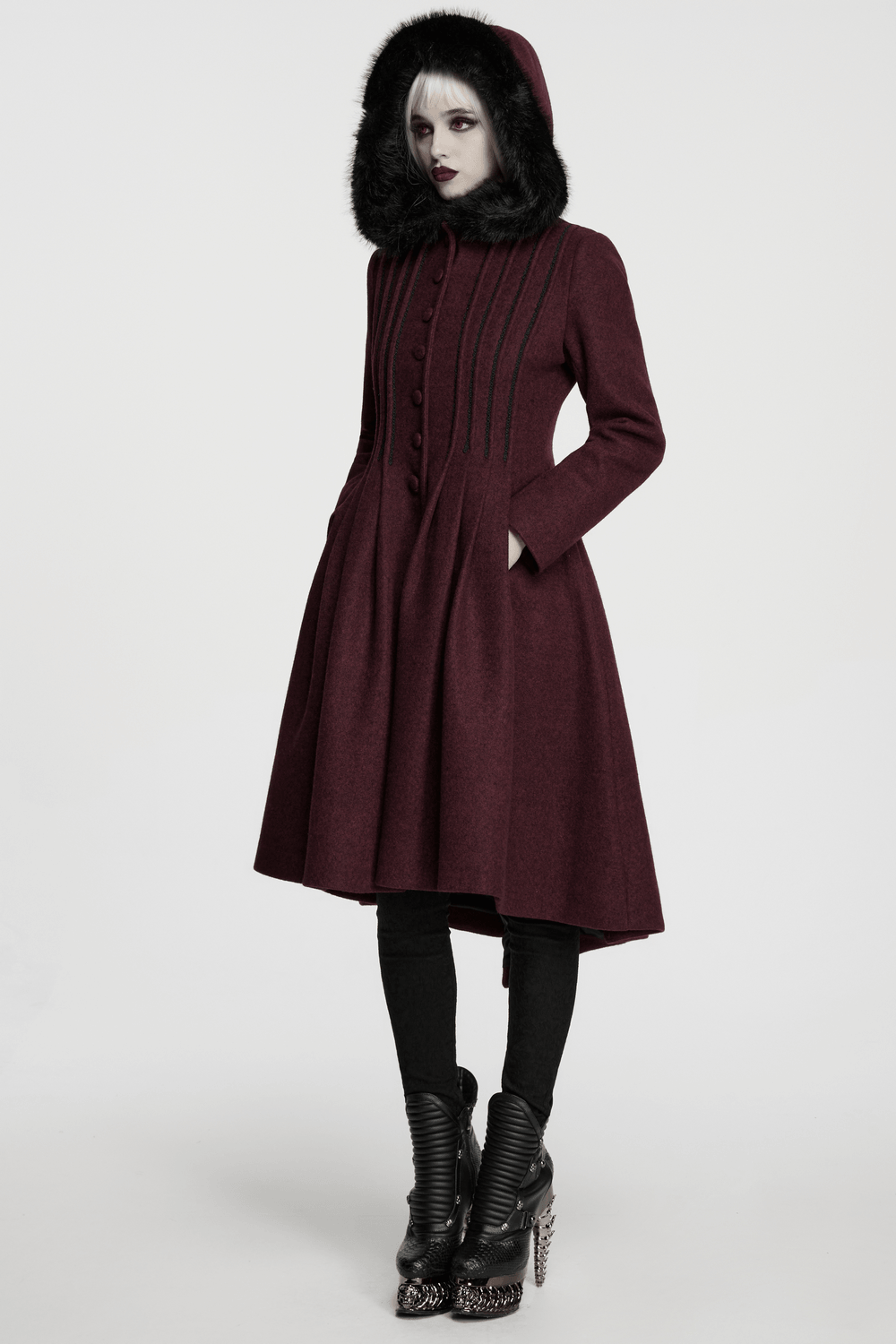 Gothic Burgundy Wool Coat with Fur Hood for Women worn by model, showcasing fashionable detail.