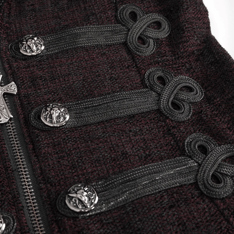 Close-up of gothic burgundy coat detailing, featuring unique buttons and intricate black fastening loops.