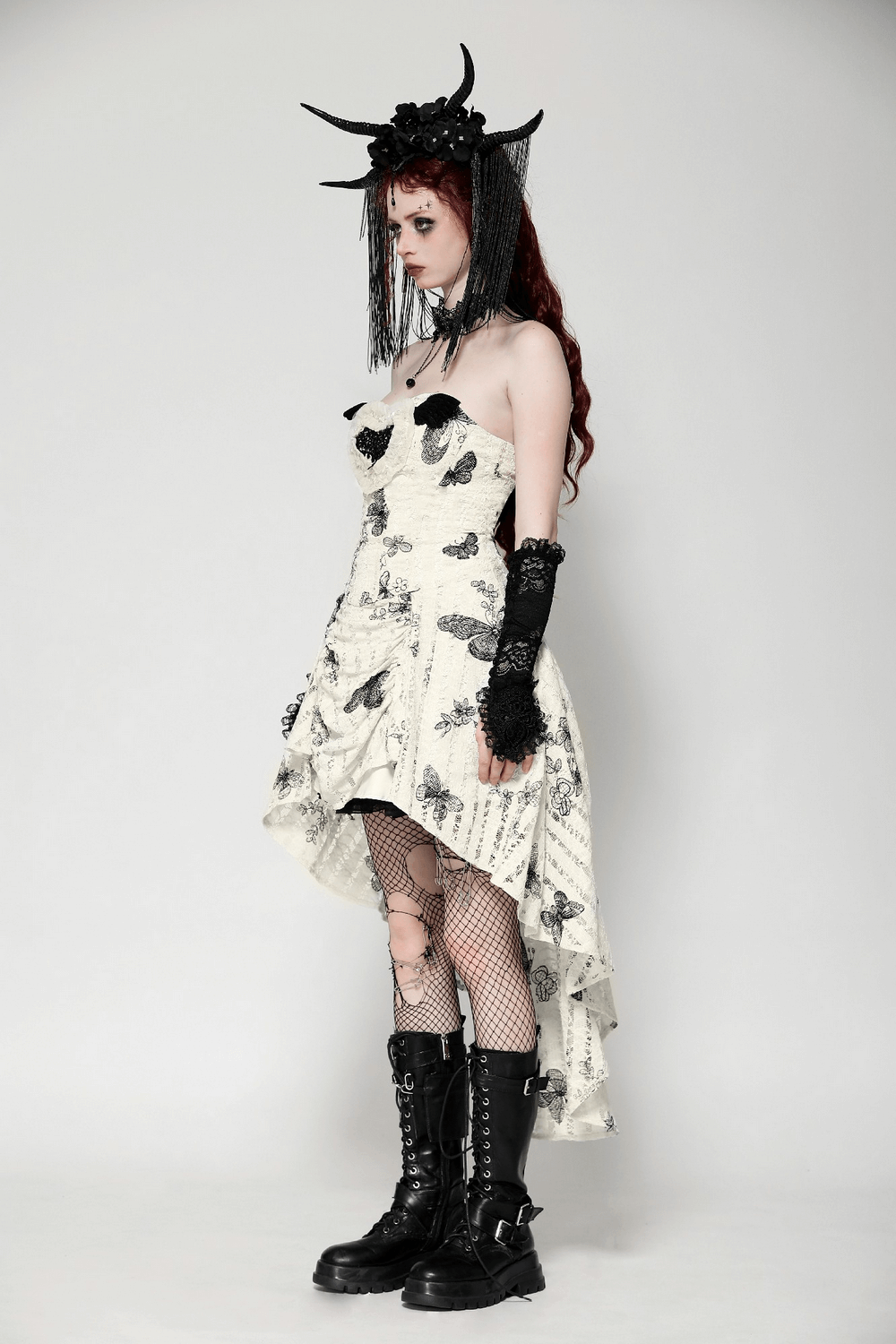 Gothic butterfly print off-shoulder dress with lace-up detail, layered style, and edgy accessories.