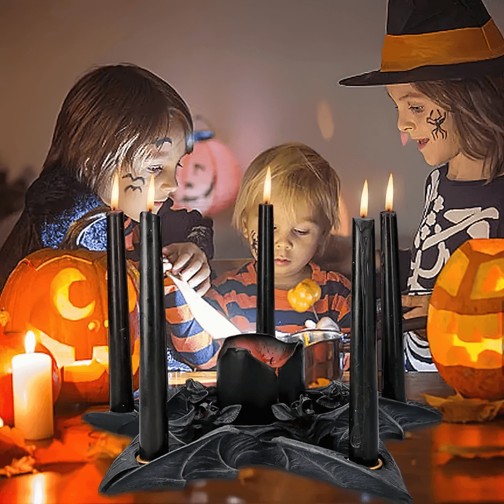 Kids enjoying Halloween with a gothic candle holder featuring bats, pumpkins, and spooky decor.