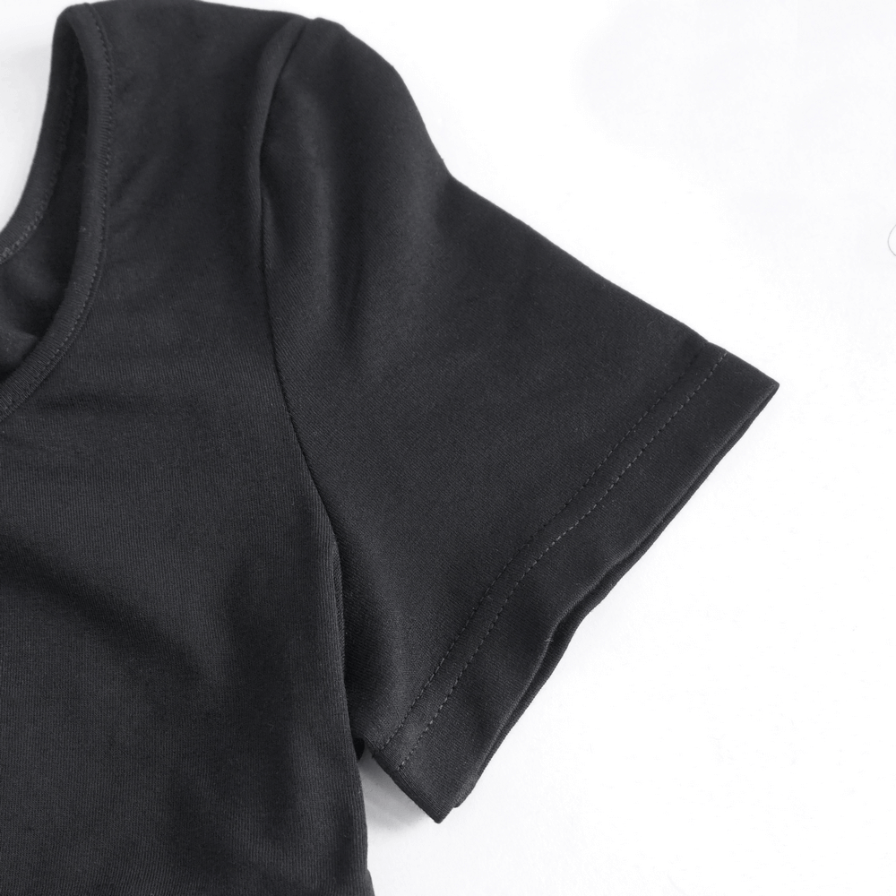 Close-up of black short sleeve crop top showcasing the edgy style and soft fabric.