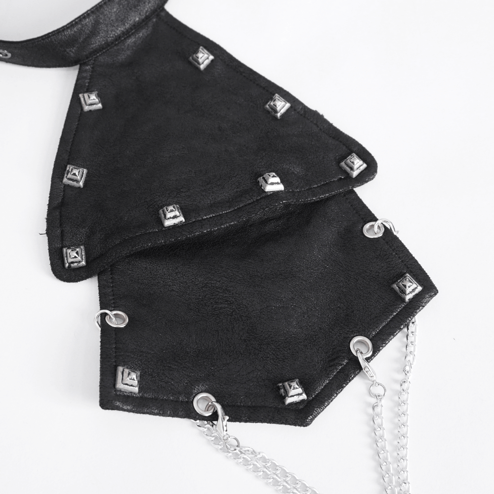 Gothic shoulder accessory with studs and chains for an edgy look, perfect for punk and alternative fashion.