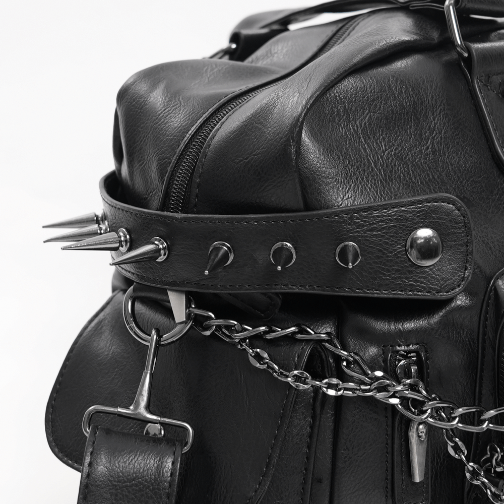 Gothic black tote bag with spike accents and chain detailing, perfect for edgy fashion lovers.