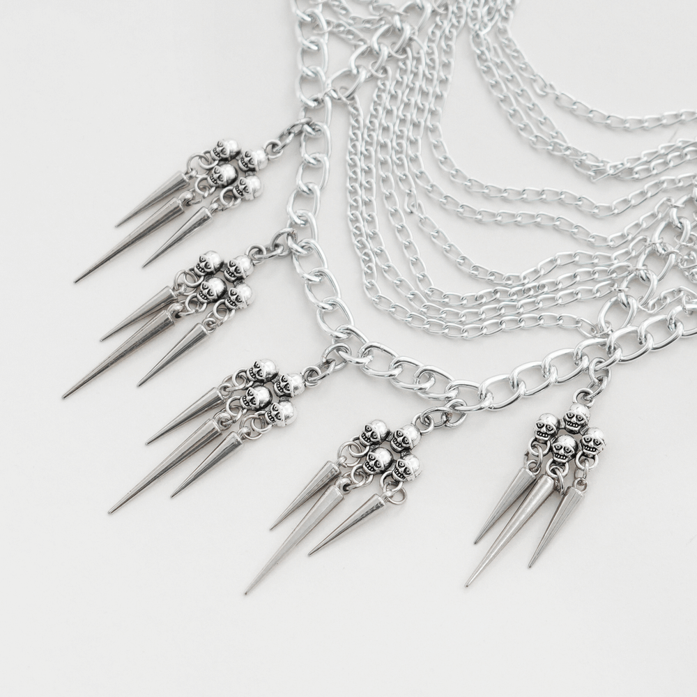 Gothic silver chain headpiece with spiked skull pendants for punk aesthetic.