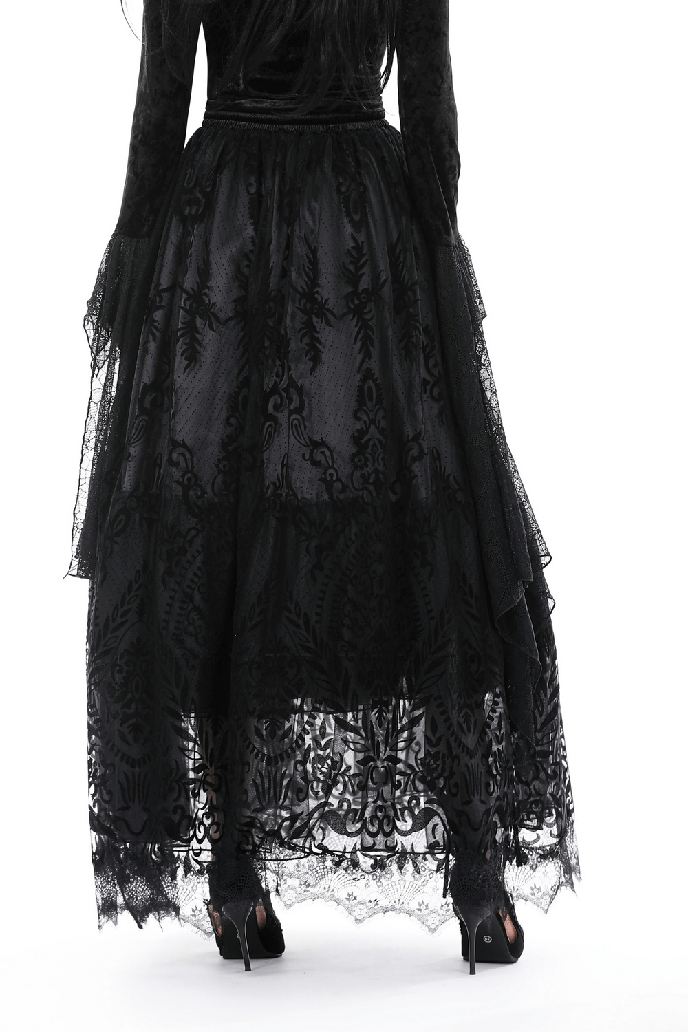 Elegant back view of a Gothic chic black lace maxi skirt with intricate damask patterns.