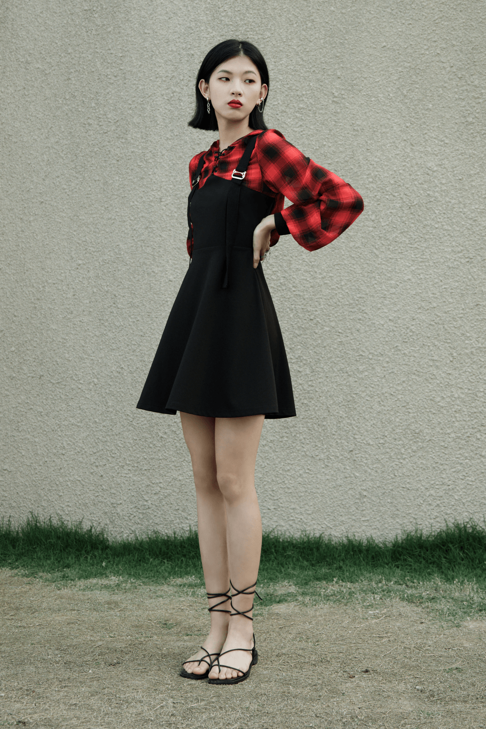 Edgy Gothic Chic Plaid Hooded Mini Dress with metal buckles and lantern sleeves, perfect for punk rock style.