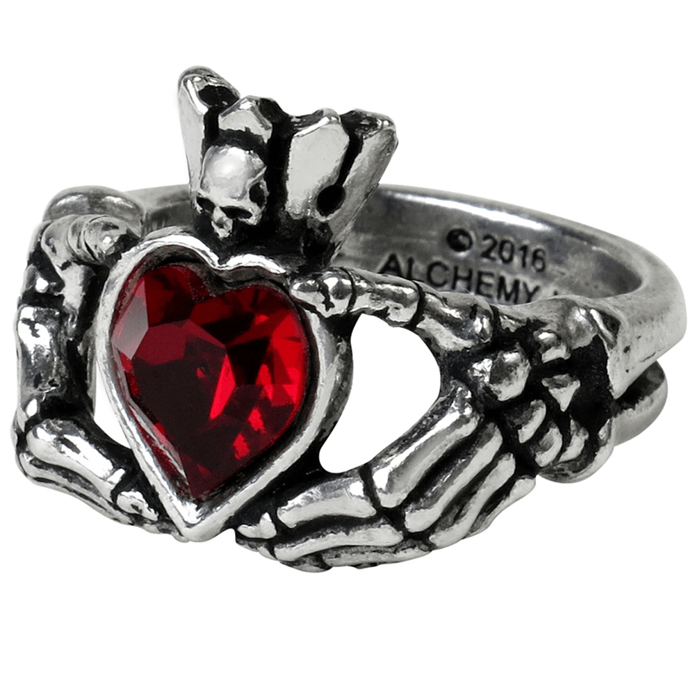Gothic Claddagh by Night Ring featuring red heart crystal and skeletal hands, symbolizing love and loyalty.