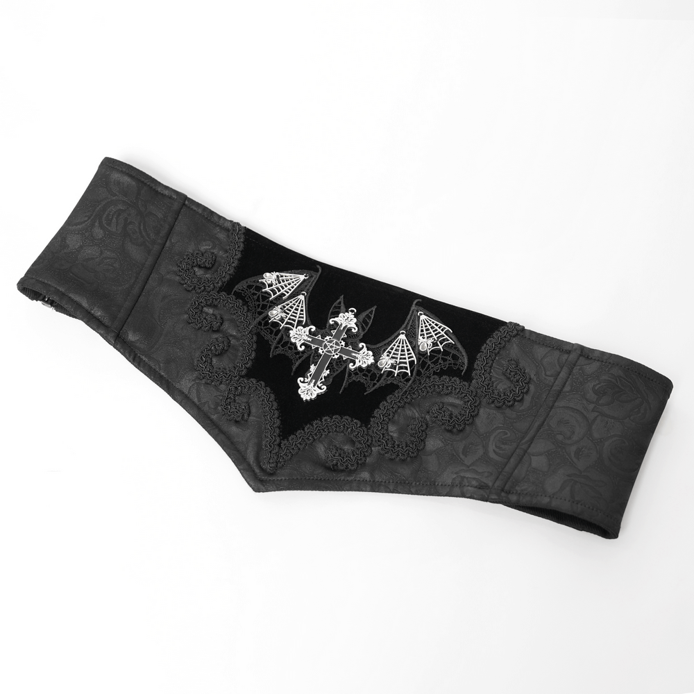 Gothic corset belt featuring embroidered bat wings and a cross, crafted from luxurious black velvet.