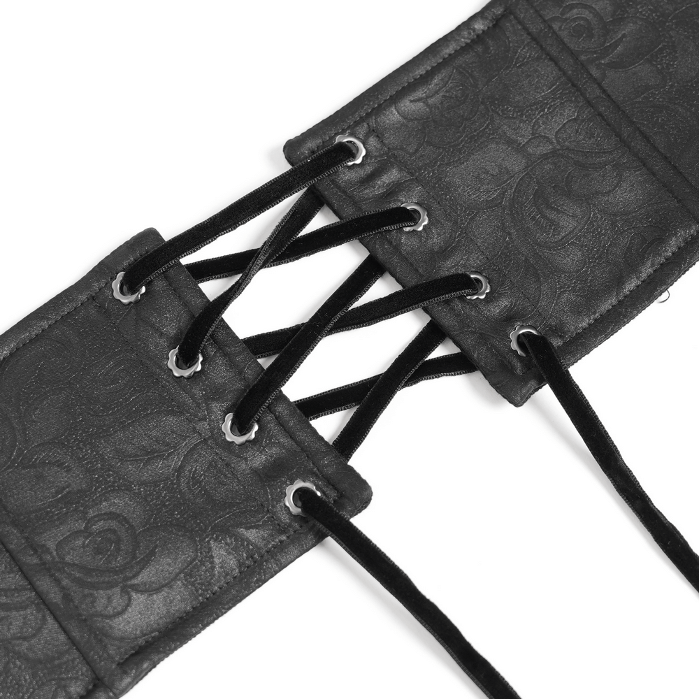 Close-up of gothic corset belt showing lace-up back design in rich black jacquard fabric.
