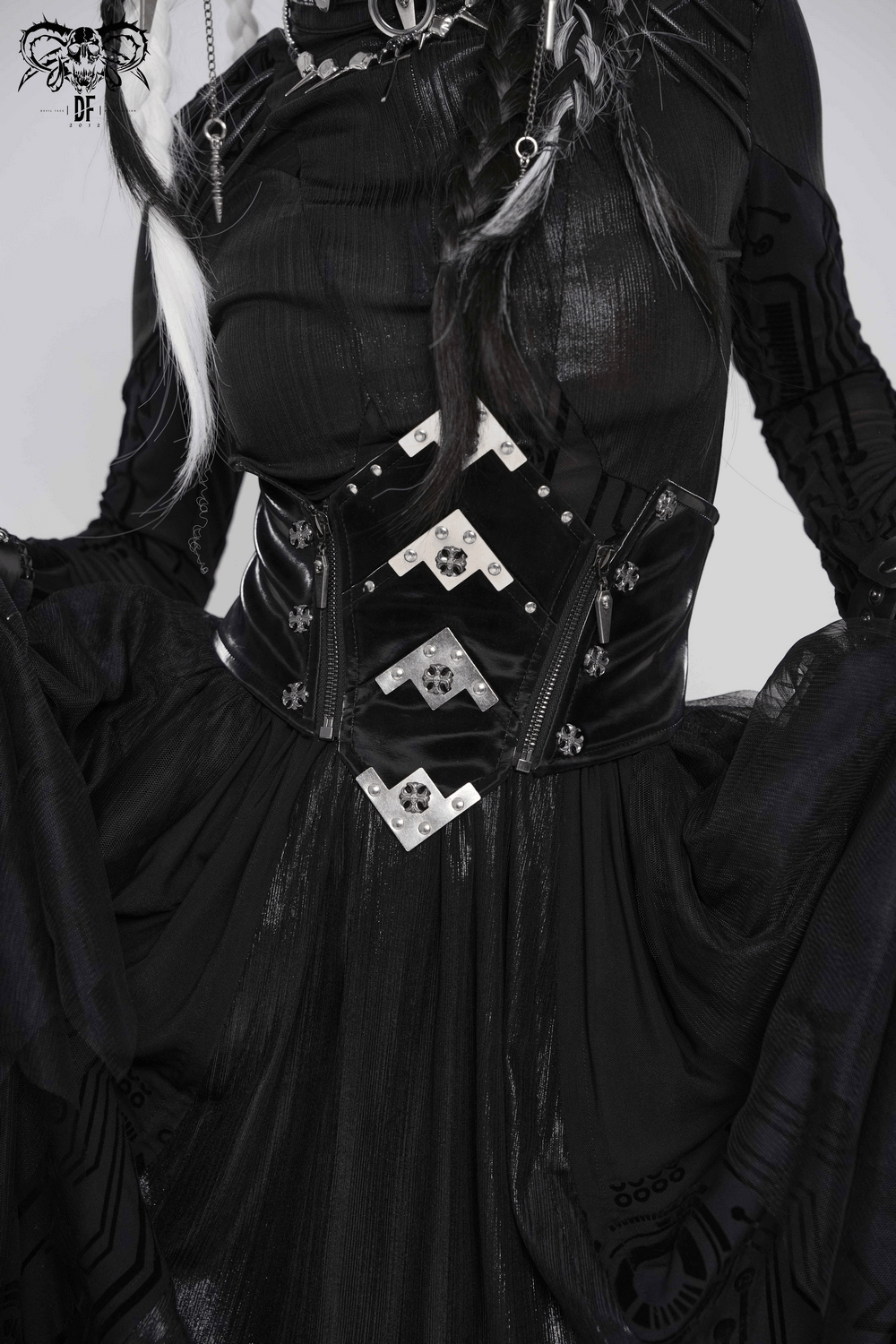 Gothic Corset Belt with Metal Cross Stud Details Trim featured over a dramatic black outfit, showcasing its patent leather and silver accents.