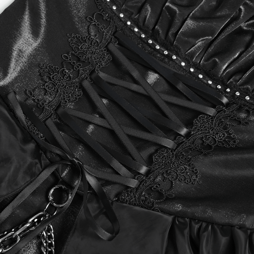 Gothic Corset Dress with Chains and Layered Tulle black lace-up bodice with chains, studs, and dramatic Gothic detailing