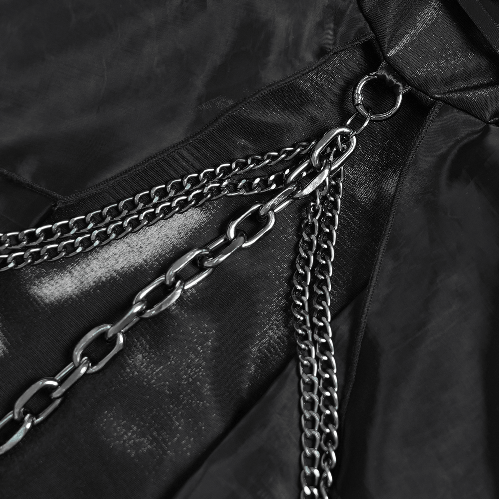 Gothic Corset Dress with Chains and Layered Tulle black dress close-up with dramatic draped chains and sheer gothic texture