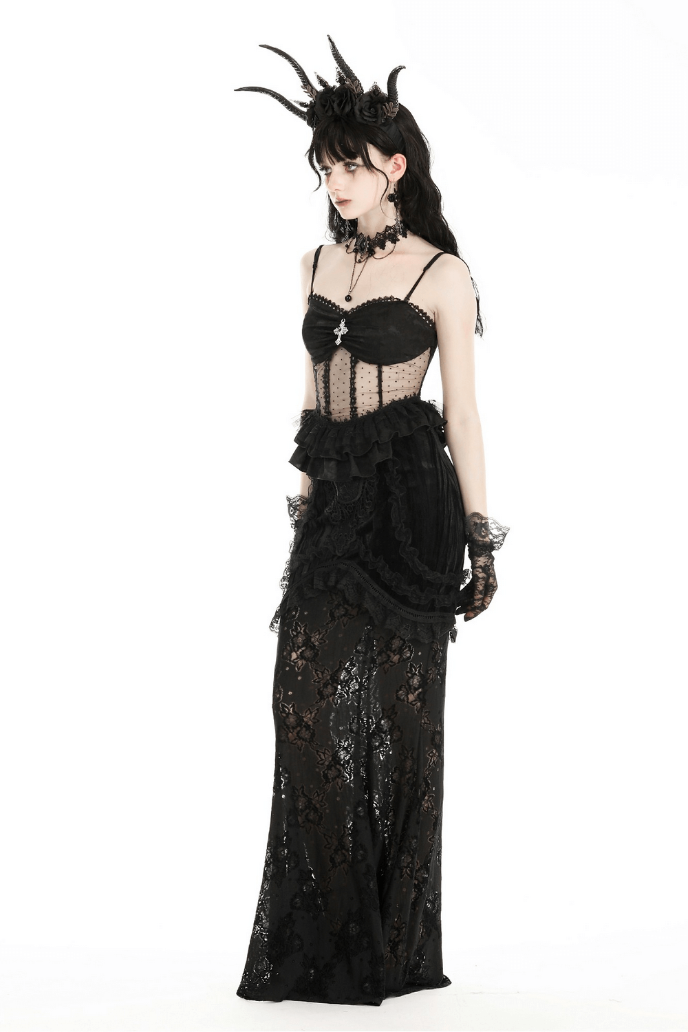 Gothic corset top with lace and polka dots, black gown with dramatic details and elegant accessories.