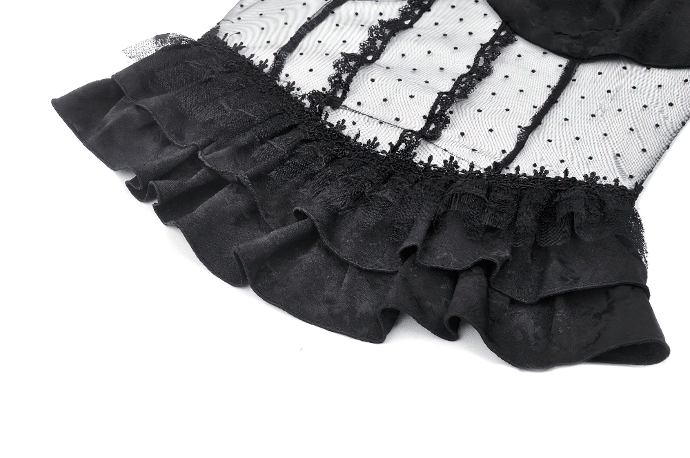 Elegant gothic corset top showcasing lace and polka dot detailing with ruffled trim.