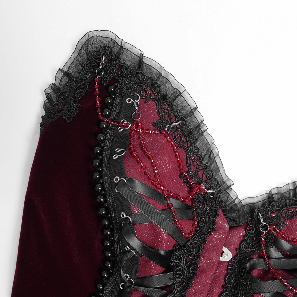 Gothic burgundy corset with black lace trim, satin lacing, and bead chains, showcasing Victorian elegance.