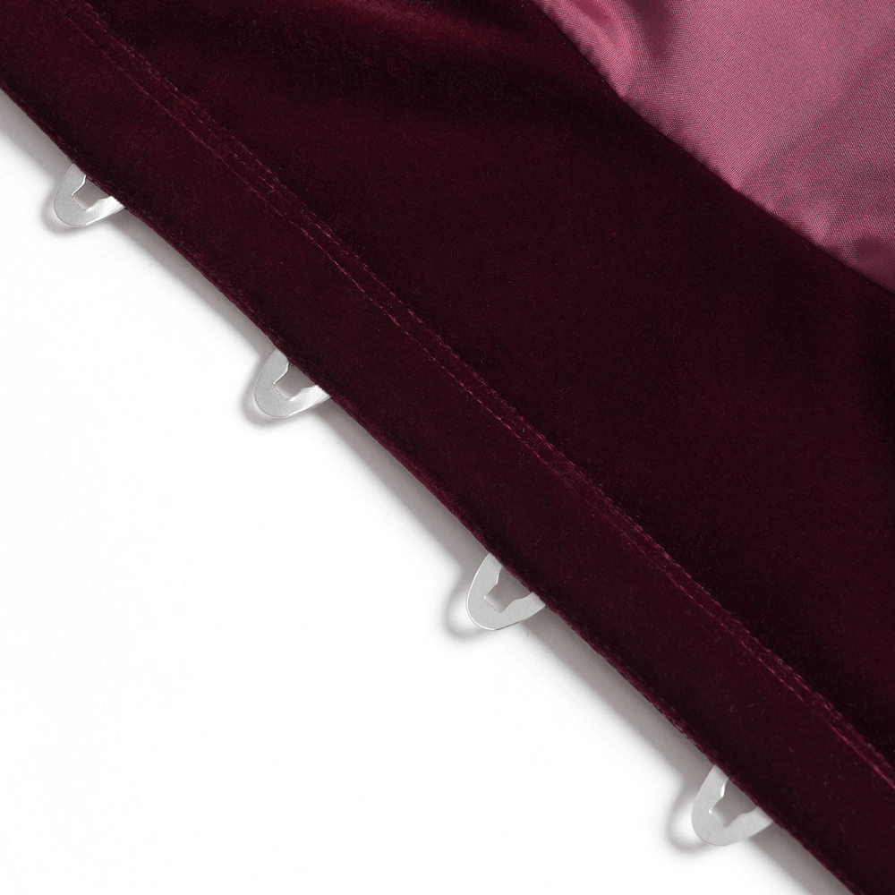 Close-up of burgundy satin corset edge featuring lace trim and clear hook-and-eye fastenings for a secure fit.