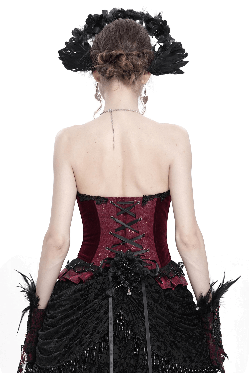 Back view of a burgundy gothic corset with lace trim and satin ribbon lacing, perfect for Victorian-inspired fashion.