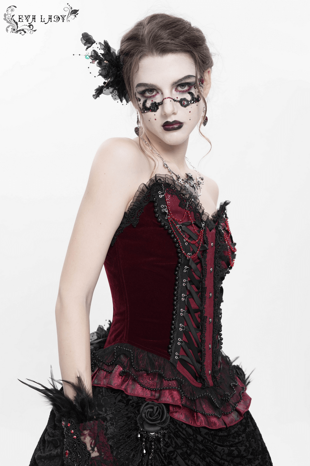 Burgundy gothic corset with lace trim and satin ribbon lacing, styled for a dramatic Victorian look.