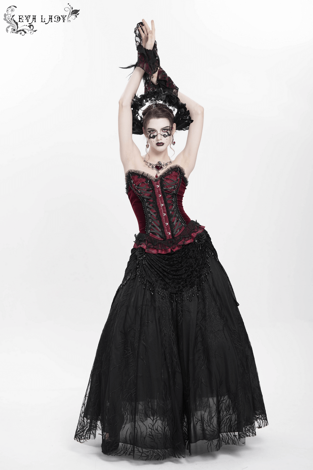Victorian-inspired gothic corset in burgundy with lace trim, paired with a dramatic black skirt and elegant accessories.