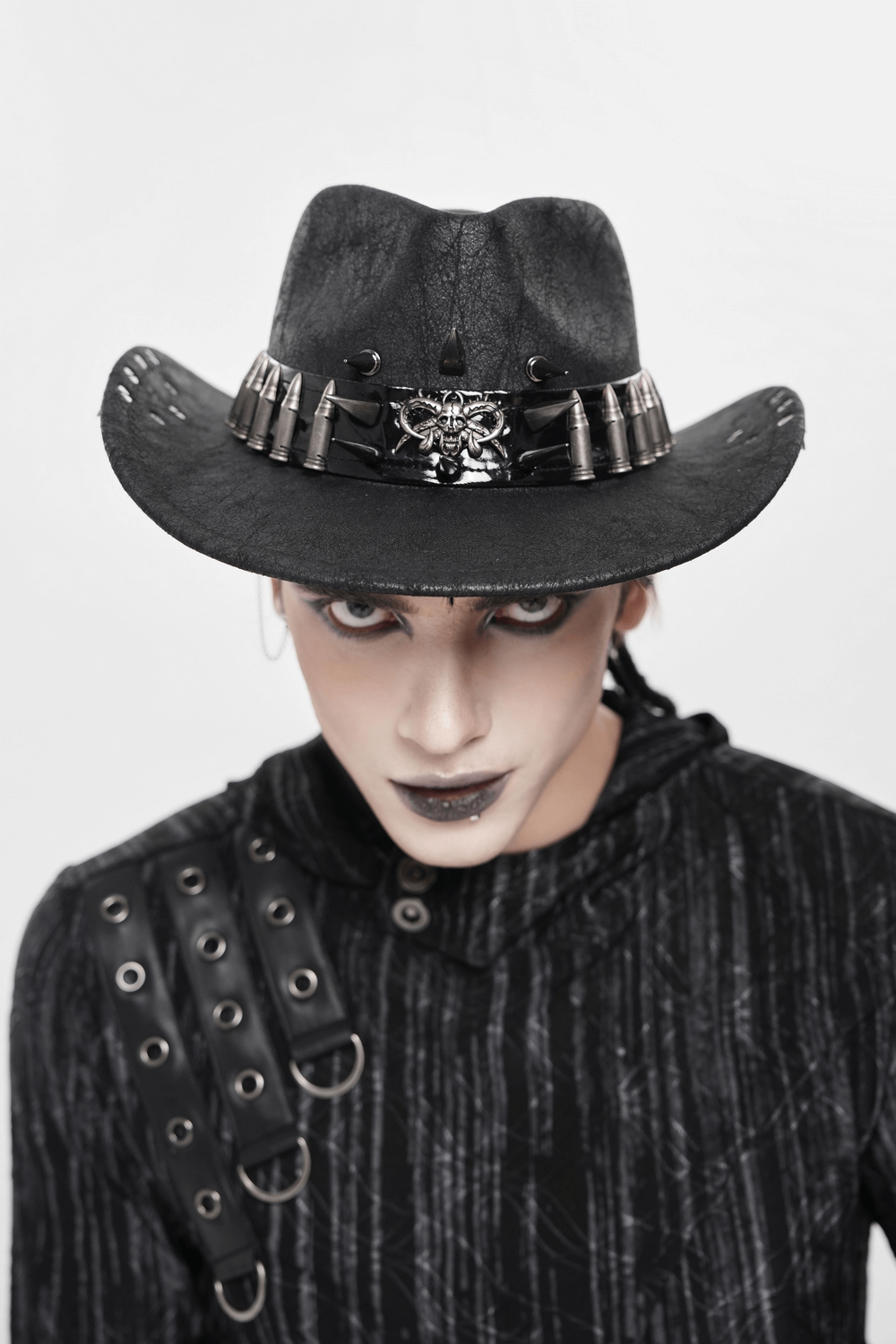 Gothic Cowboy Hat with Metal Bullets and Skull Design worn by model showcasing dark elegance and rugged style.