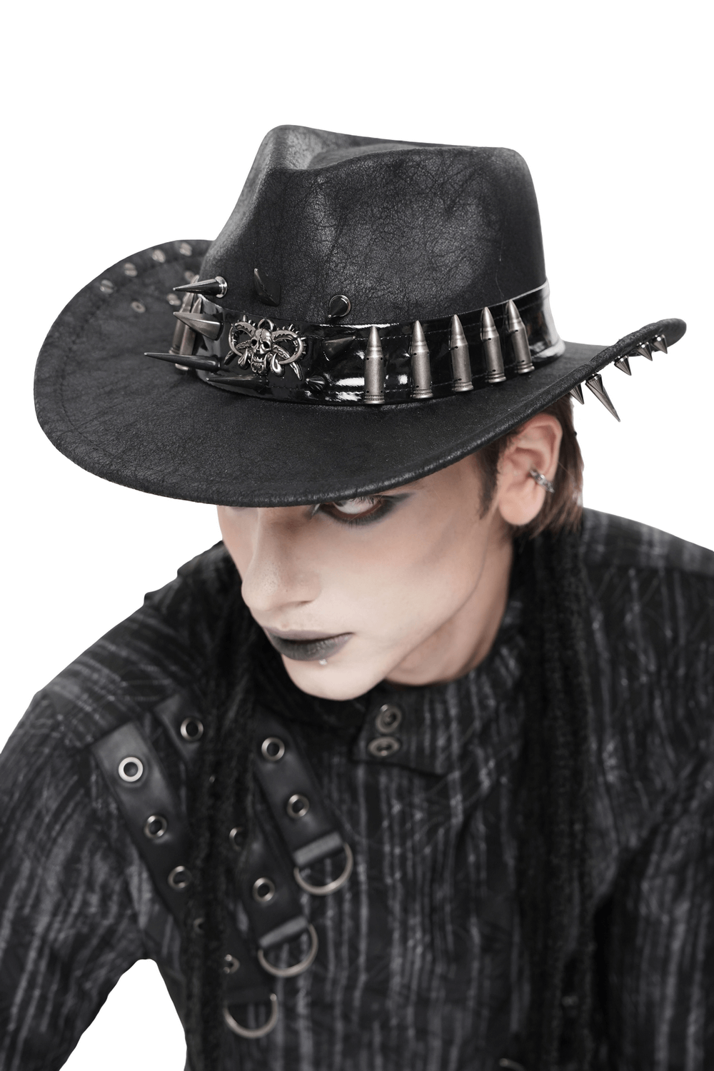 Gothic Cowboy Hat with Metal Bullets and Skull Design worn by a model with a gothic style.