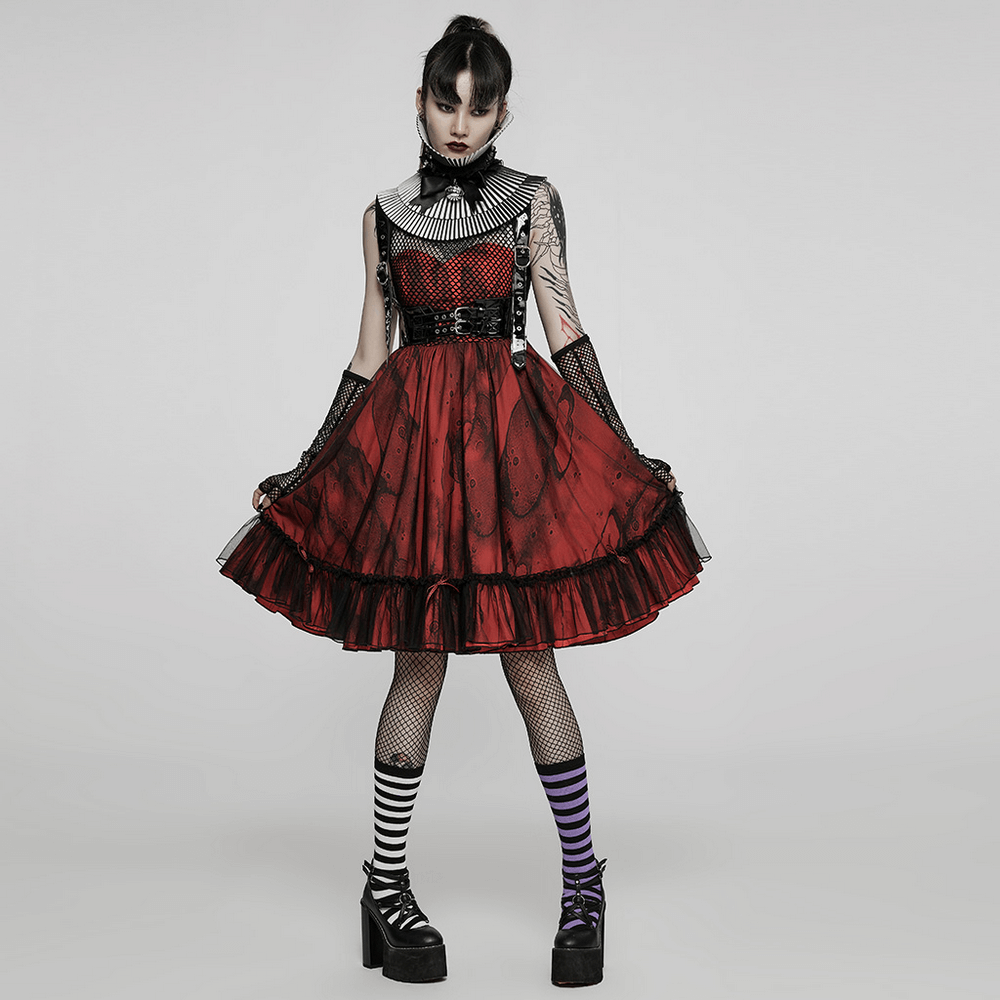 Gothic fashion model in a black and red dress with fishnet stockings and stylish platform shoes.