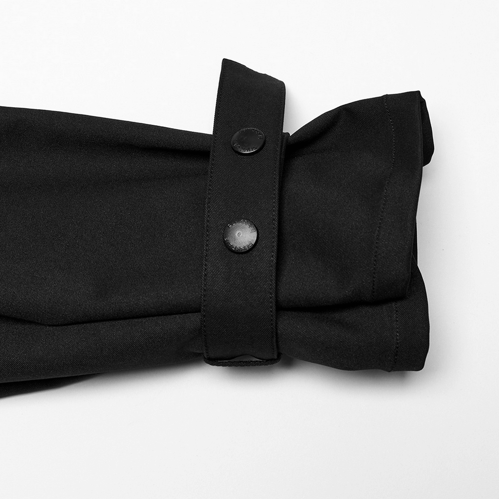 Close-up of the cuffs of a Gothic cropped jacket featuring sleek metal buttons and elegant ribbon details.