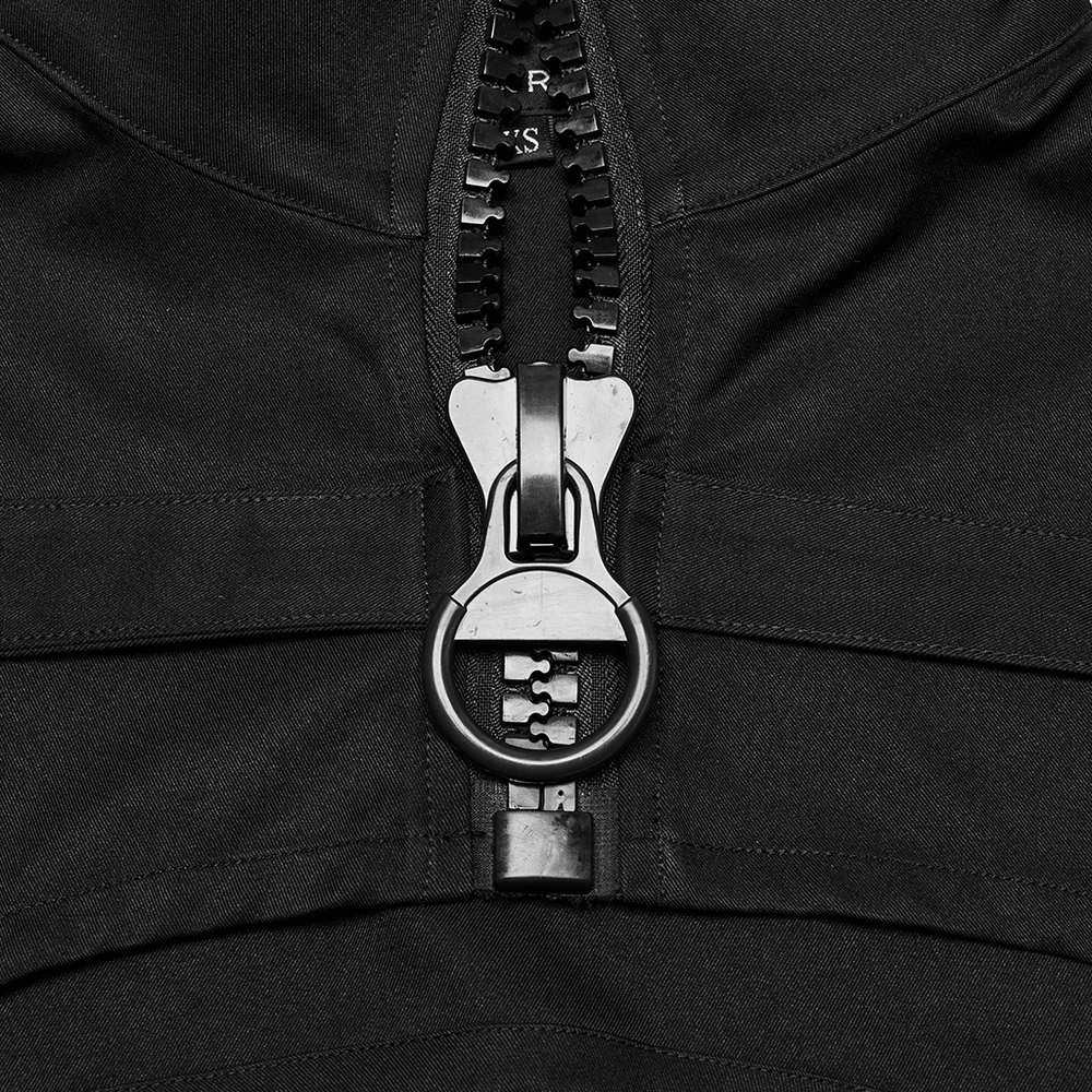 Close-up of a gothic cropped jacket featuring a metal loop and decorative zipper details.