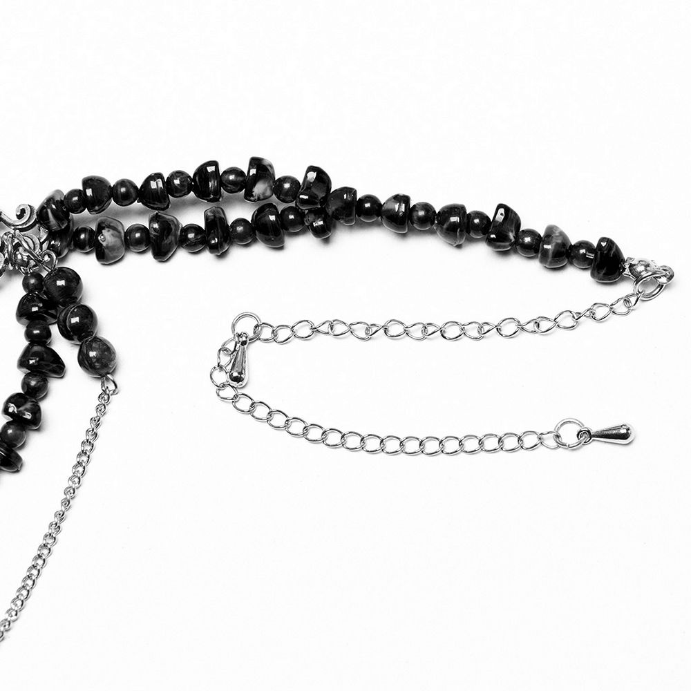 Gothic cross necklace featuring black beads and alloy chains, showcasing retro carved design and unique vintage-inspired style.