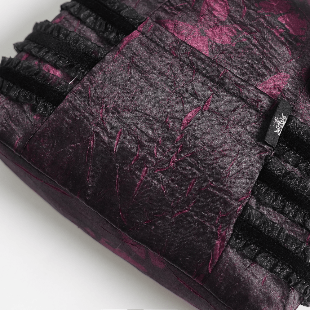 Gothic Cross Velvet Handbag with Ruffle Trim Details featuring rich black and burgundy velvet and layered ruffle trim.