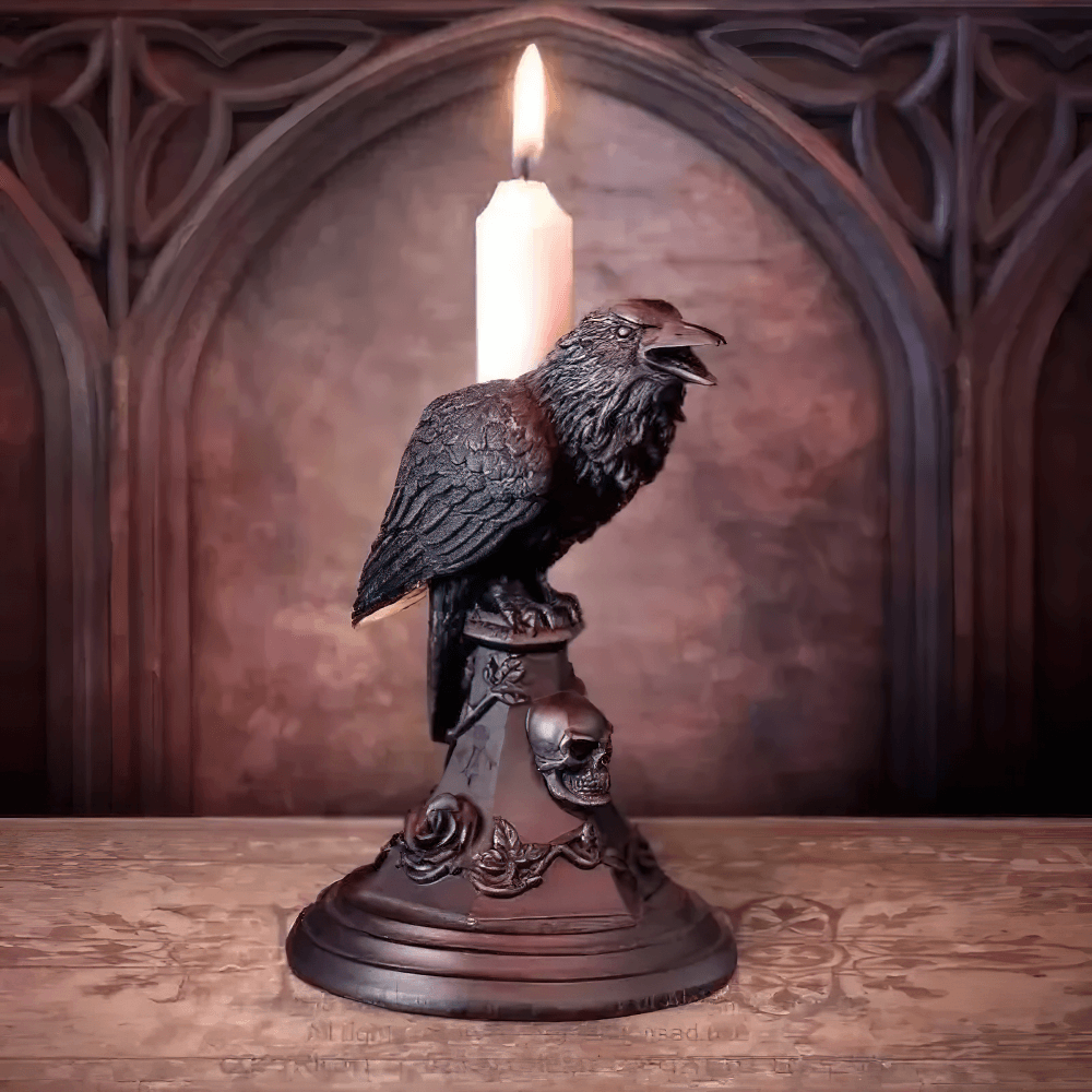 Gothic crow candle holder with skull base, perfect for dark-themed home decor and Halloween ambiance.