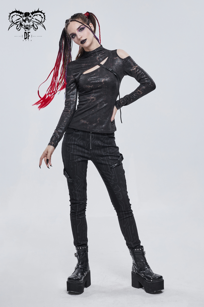 Gothic cutout black slim-fitted top for women, styled with edgy pants and platform boots, perfect for alternative fashion enthusiasts.