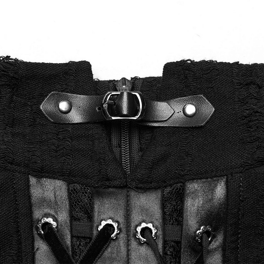 Close-up of the Gothic Decadence dress featuring black faux leather loops and intricate lace detailing.