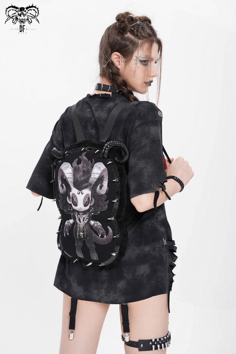 Gothic Demon Character Backpack with Horns and Spikes worn by a model, showcasing its stylish design and spiked details.