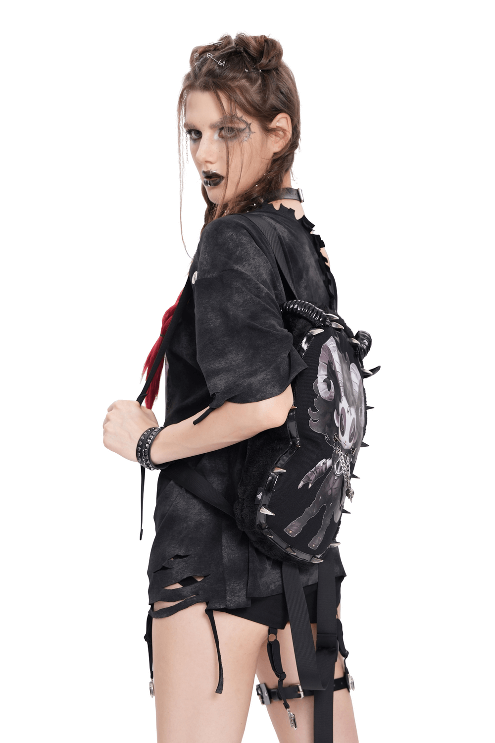 Gothic Demon Character Backpack with Horns and Spikes worn by model in edgy outfit with black details.